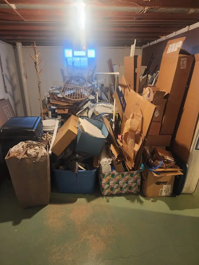 Roll-off dumpster container at job site for 6 Yard Dumpster Rental in Atlantic Highlands